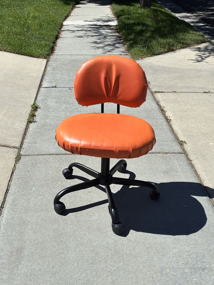 Orange Vinyl Swivel Cross Legged Office Chair with Wheels