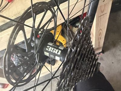 27.5” Dt Swiss 350 rear hub boost with 11 sprocket cassette and light bicycle carbon fiber rim (broken rim) centerline 180 roto