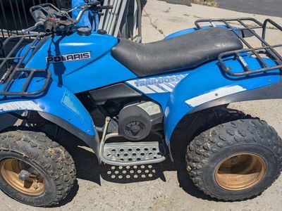 2 Polaris 250ES Trailboss 4 wheelers 2x4 2 stroke engines both ran, comes with new belts and carb kits, as is, bring a trailer!