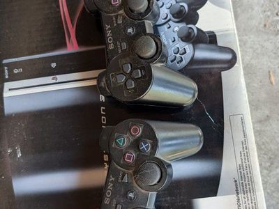 Sony PlayStation 3 Console with 2 Controllers - Used - Plus Games Collection