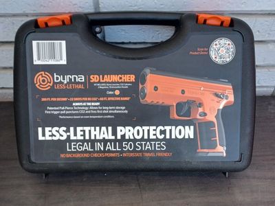 Byrna Less-Lethal SD Launcher in Safety Orange