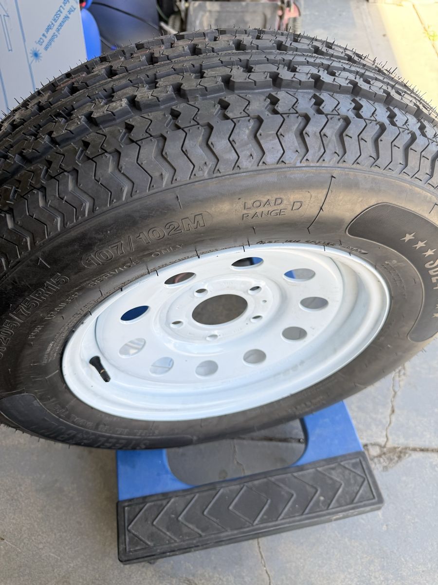Trailer tires with rims 15 ,,,NEVER USED