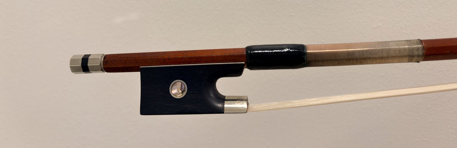 A very fine old German violin bow by H.R. Pfretzschner 59 grams 4/4