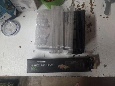 Seedling heat mat and 7 seed trays.