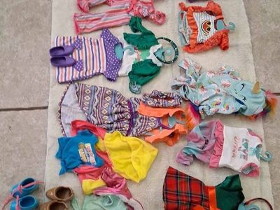 Over 30 pieces of My Life/American Girl doll clothes, shoes. outfits and accessories.