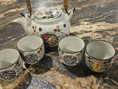 Japanese Ceramic Teapot and Four Cups Set with Floral Design