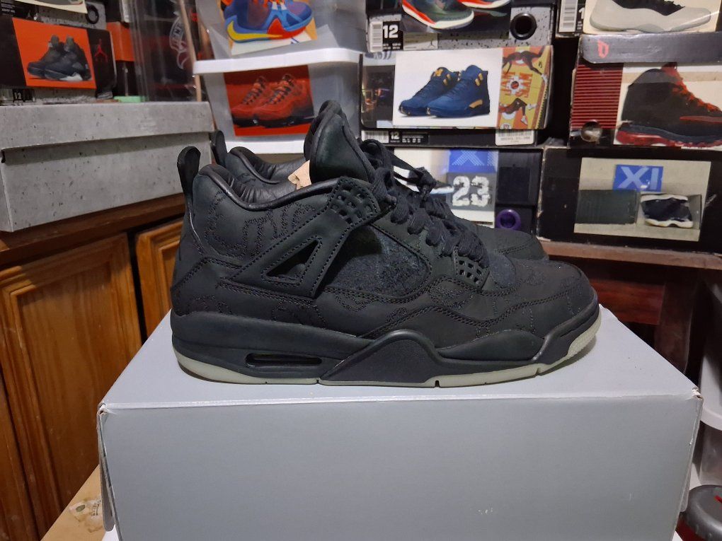 2017 KAWS x Air Jordan 4 Retro "Black"