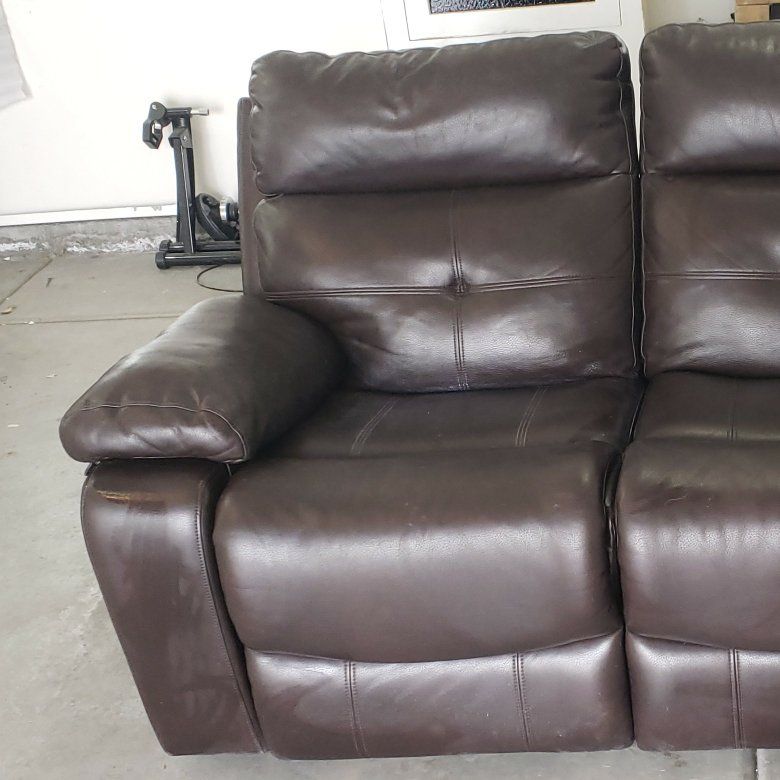 Dual recliner faux leather loveseat