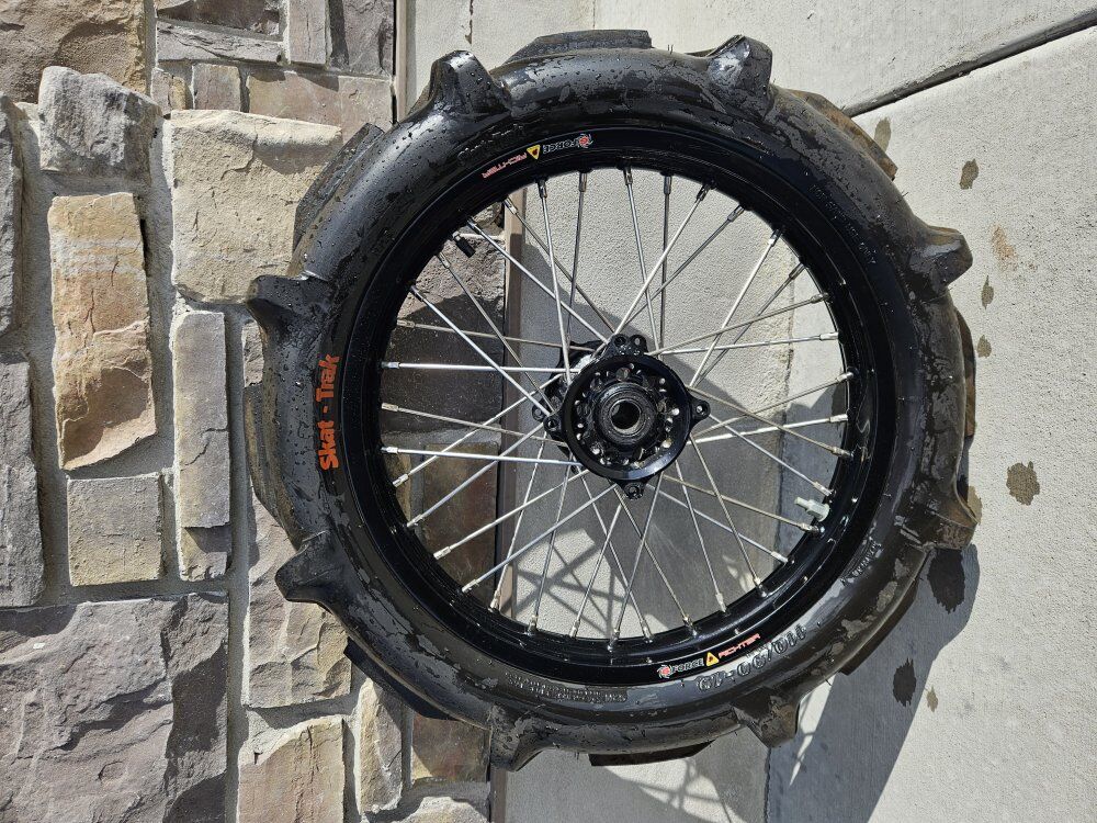 once used Paddle Tire and Rim 110/90-19