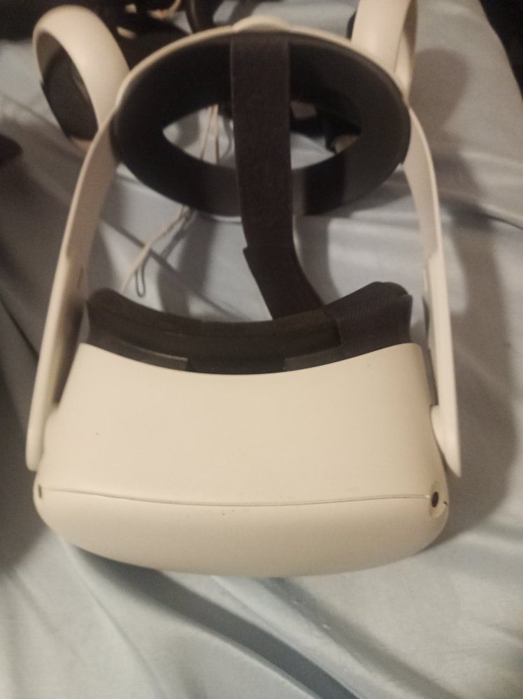 Meta Quest 2 VR Headset with Controllers, Charging Cable, and Carrying Case