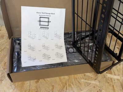 Black Metal Power Tool Storage Rack - New, Unused Garage Organizer