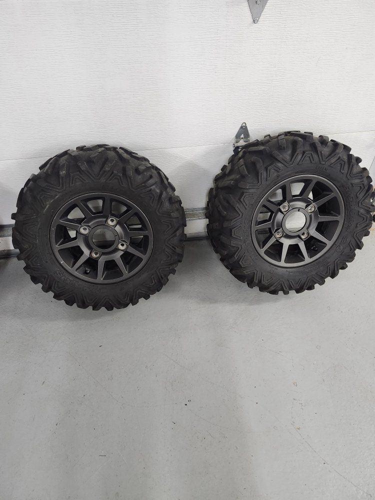Pair of 27x11x14 Maxxis Bighorn tire and Polaris wheels