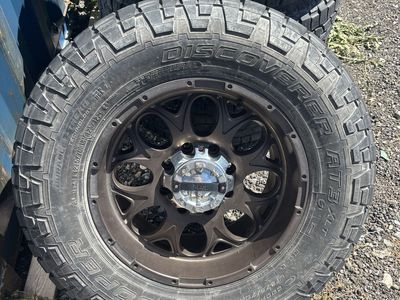 Set of 4 Cooper Discoverer AT3 XLT 275/70R18 Tires on Bronze Fuel Wheels
