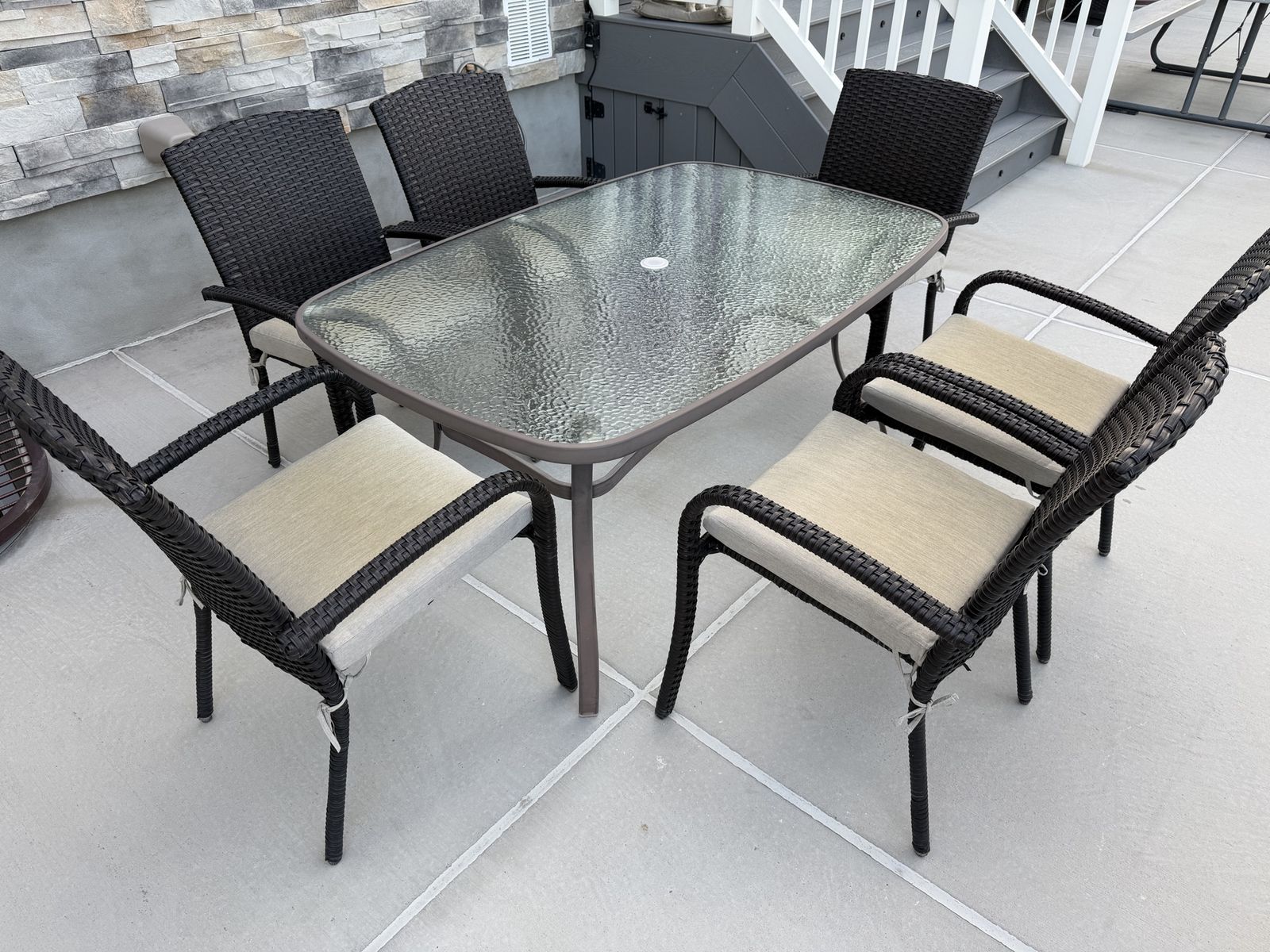 Outdoor Patio Dining Set: Glass Top Table & 8 Woven Chairs with Cushions - Weather Resistant