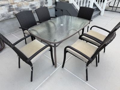 Outdoor Patio Dining Set: Glass Top Table & 8 Woven Chairs with Cushions - Weather Resistant