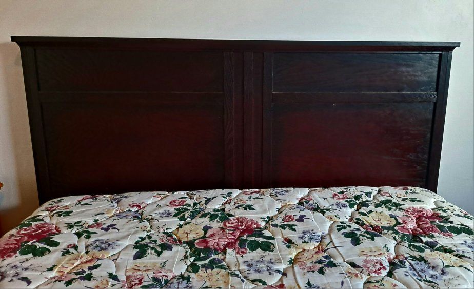 Queen size pillow top mattress & box spring with dark wood headboard