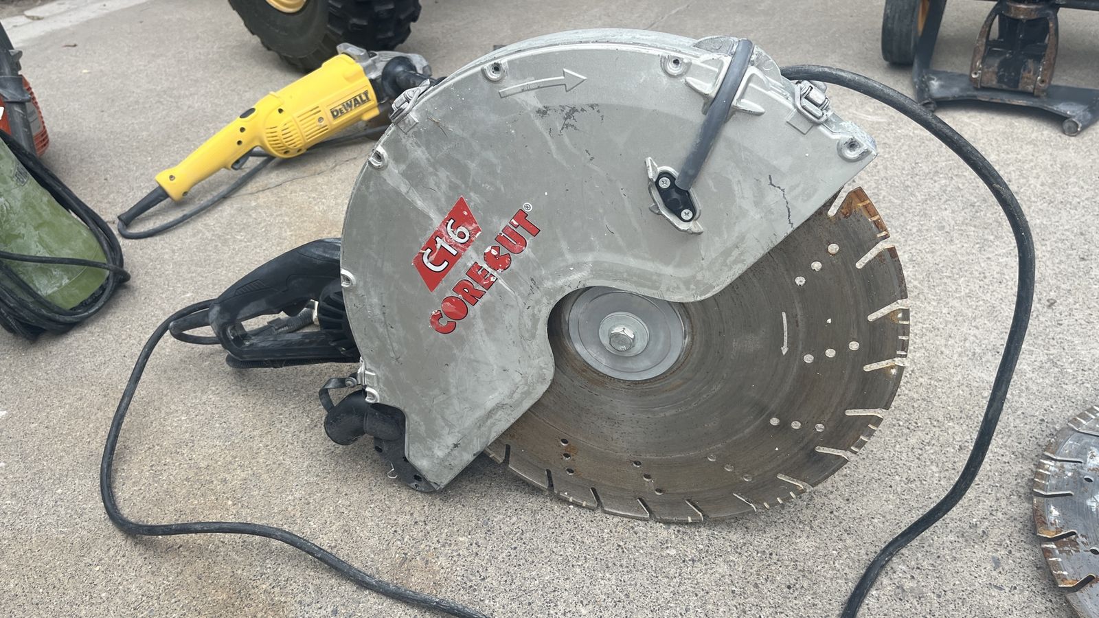 Diamond Products Core Cut C16 16” Electric Concrete Saw – Flush Cut Setup + Blades perfect for basement plumbing trenches.