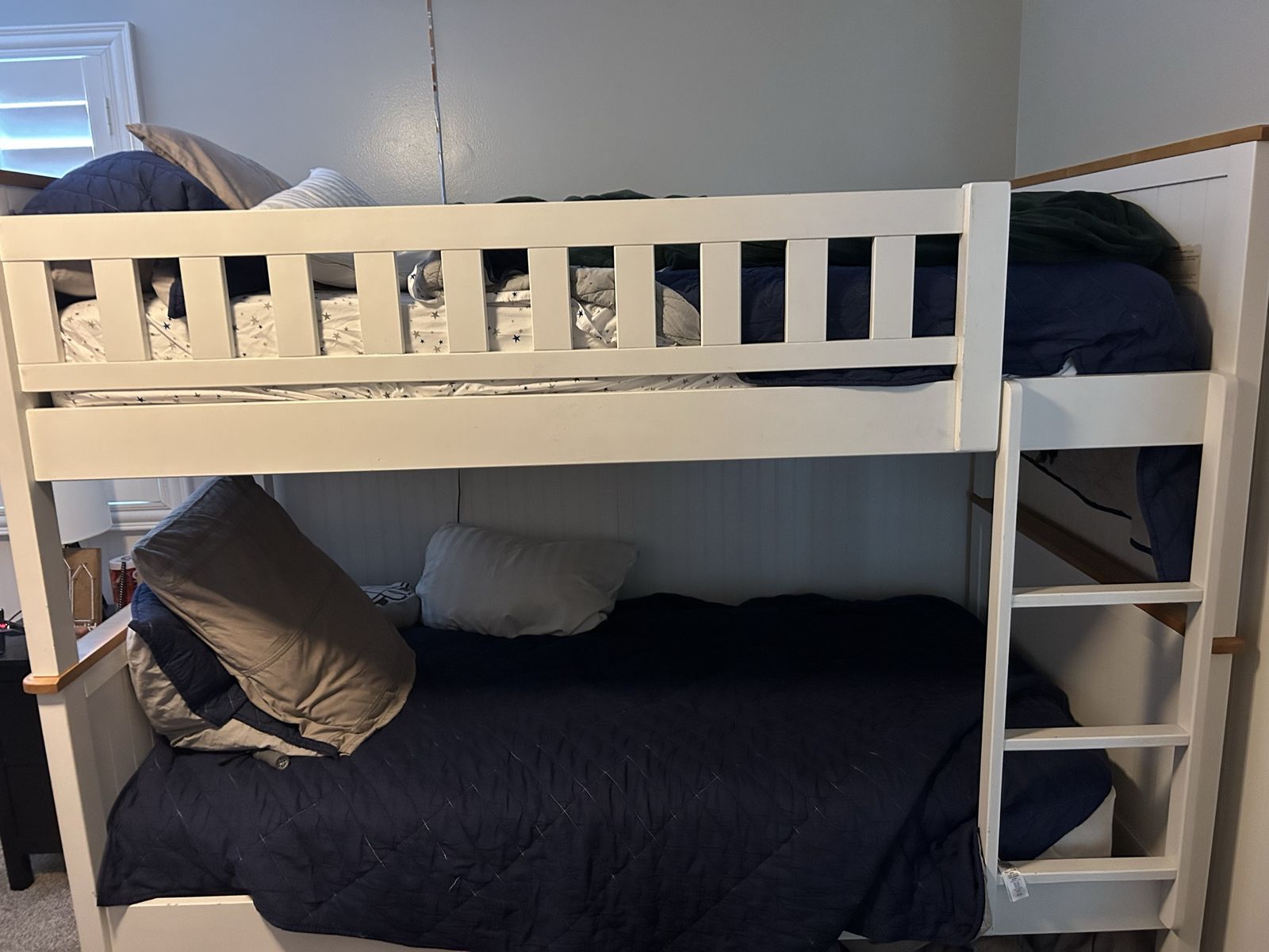 Wood bunk bed with mattresses