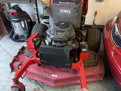 Toro GrandStand Standing Commercial Mower.