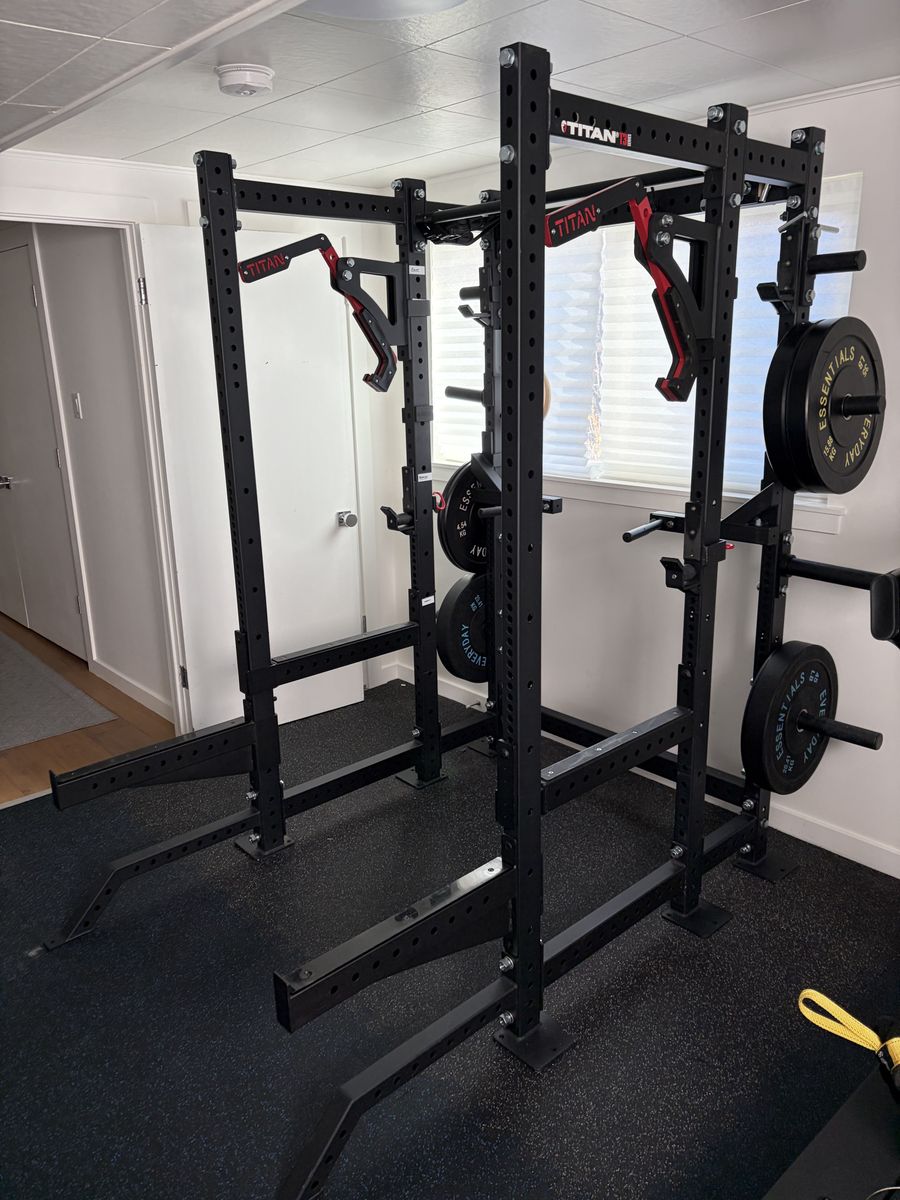 A gym in a box, squat rack with weights, attachments, and more!