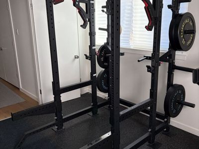 A gym in a box, squat rack with weights, attachments, and more!