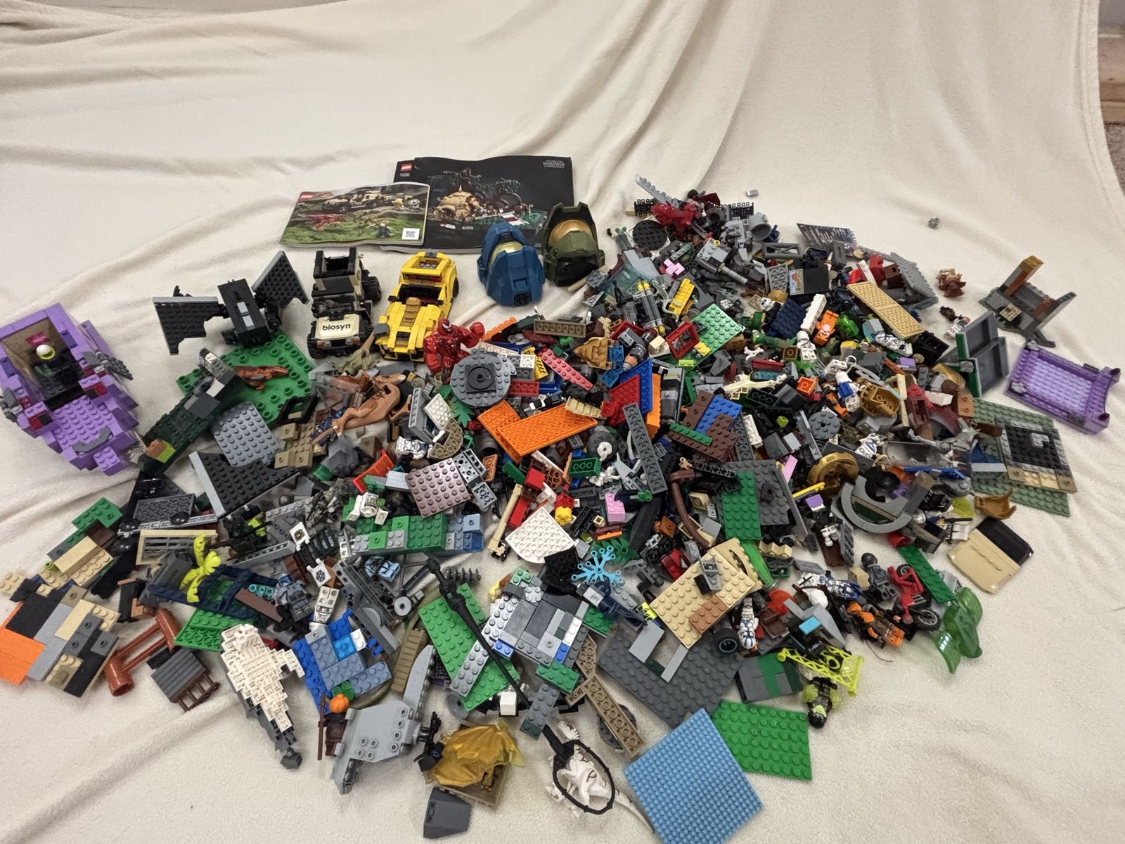 Large LEGO Bulk Lot with Jurassic World, Star Wars Manuals, and Minifigures Mixed Not a complete Set