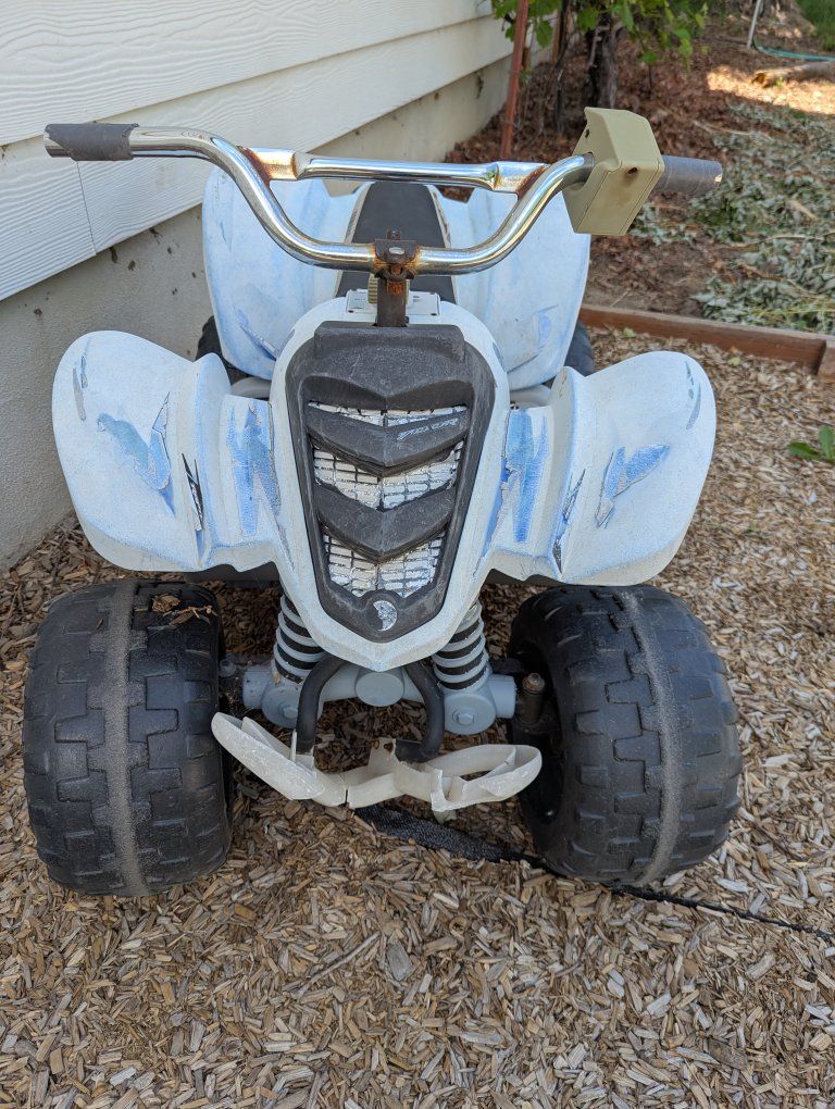 kids four wheeler (similar to powerwheels)