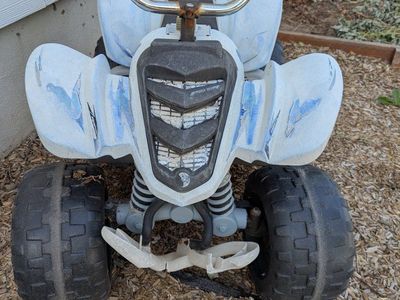 kids four wheeler (similar to powerwheels)