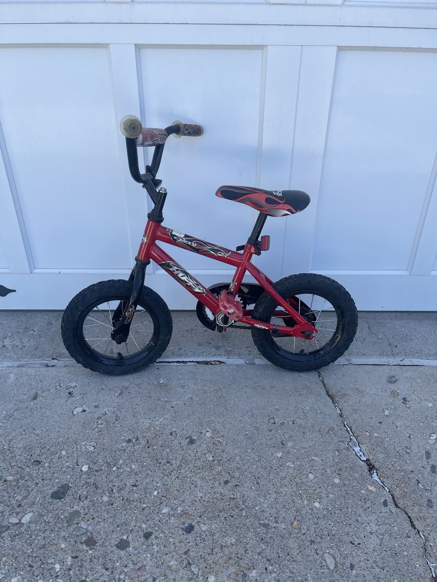 Huffy Rock It 12-inch Kids Bike Red Flame Design
