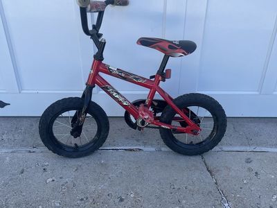 Huffy Rock It 12-inch Kids Bike Red Flame Design