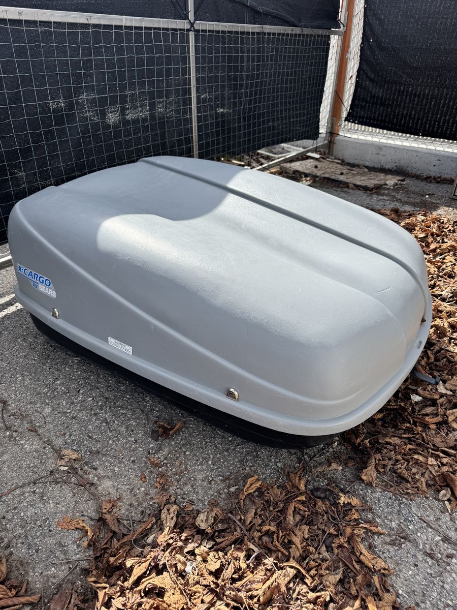 Roof-top cargo box