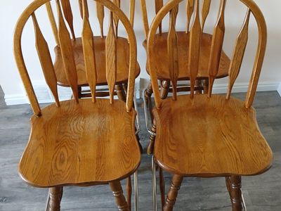 4 solid oak swivel bar stools
