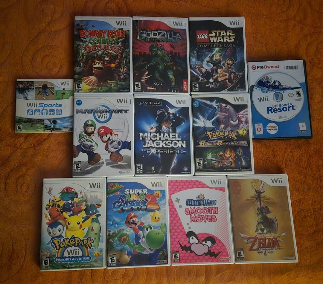 Nintendo Wii game bundle including Wii Sports Resort!  Trades considered~!