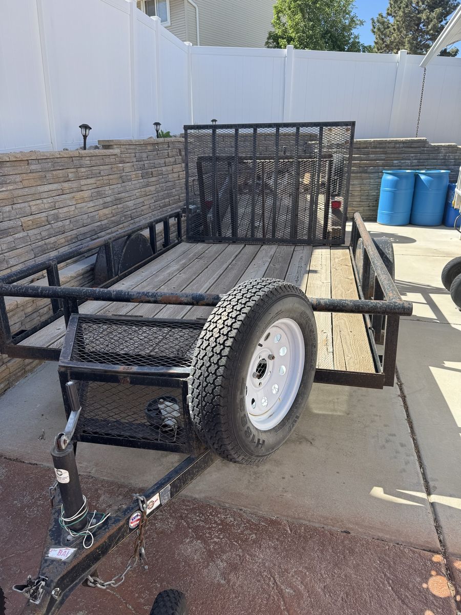 Utility Trailer with Ramp - Versatile Hauler for Equipment, Moving, and More