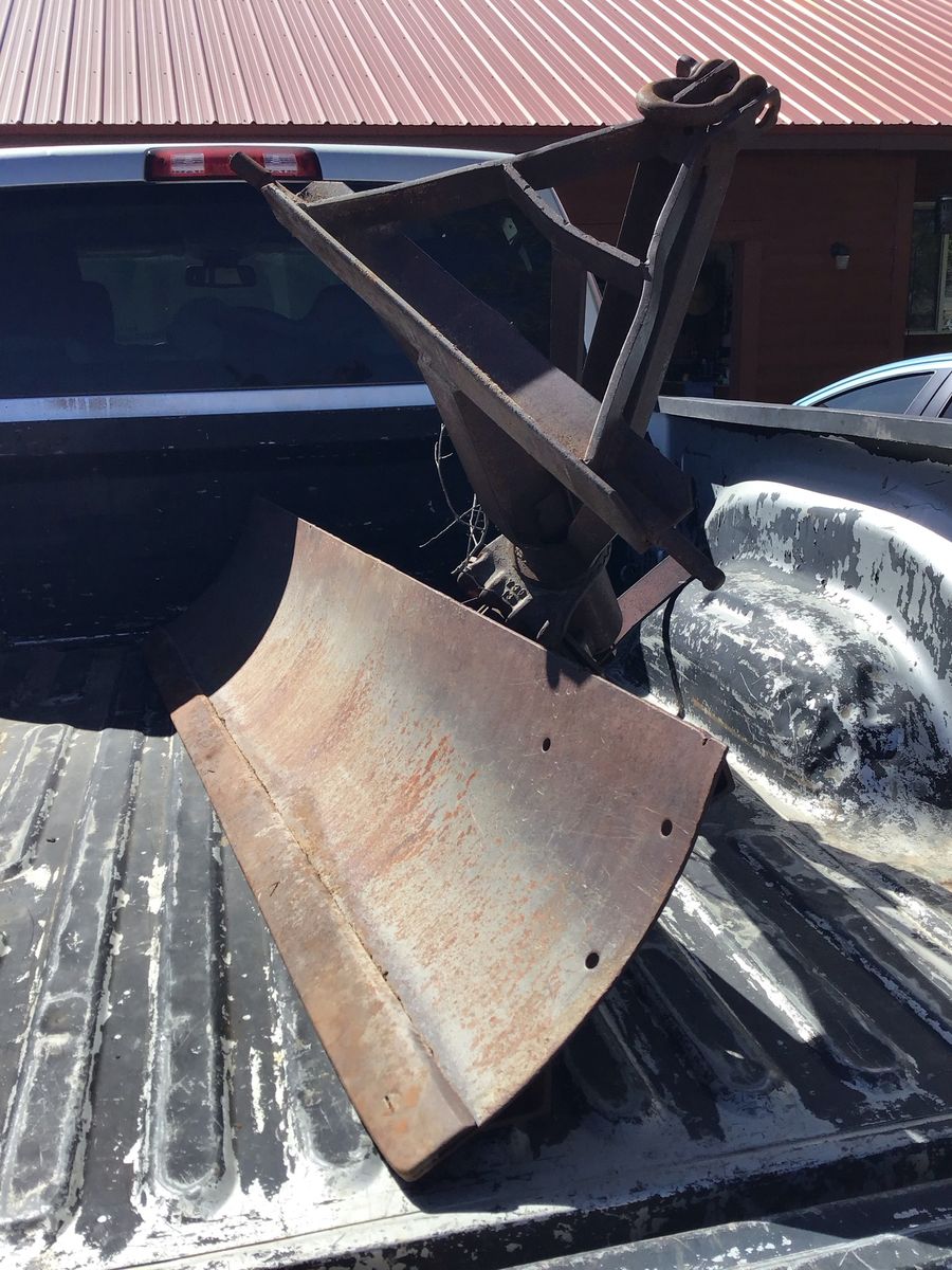 Tractor scraper blade