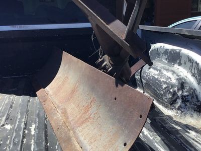 Tractor scraper blade