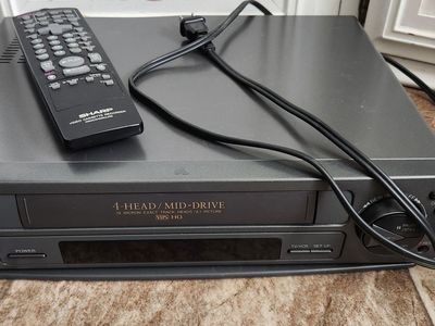 Sharp vcr player with remote