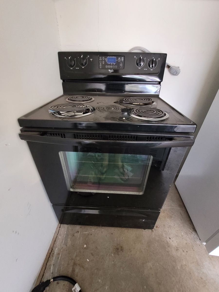 Gloss Black Whirlpool Electric Stove.  Fully functional
