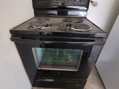 Gloss Black Whirlpool Electric Stove. Fully functional