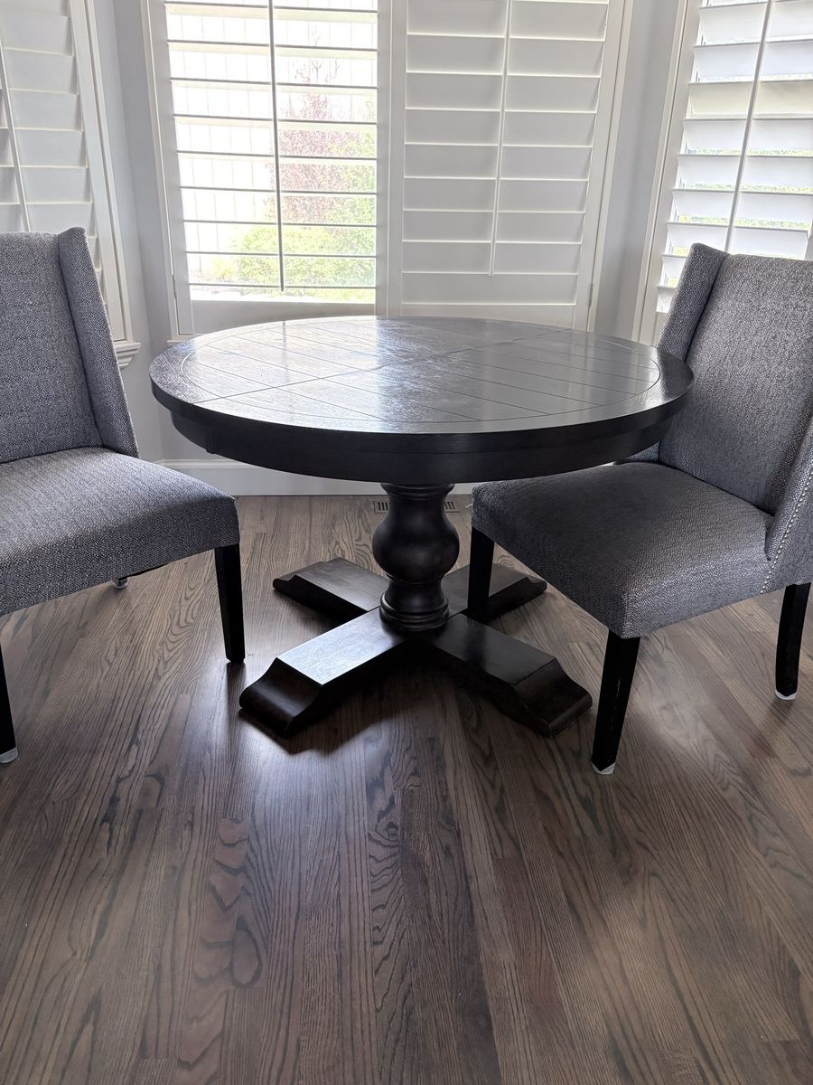 Round table and two chairs