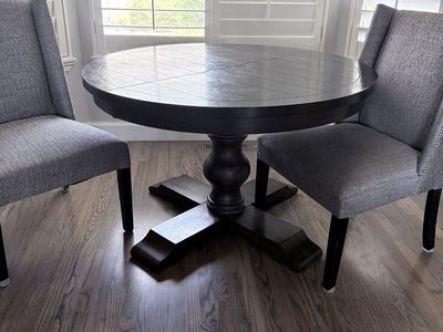 Round table and two chairs