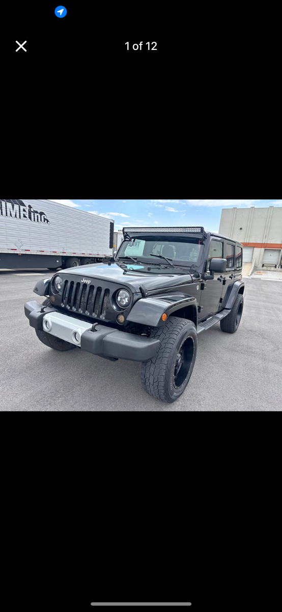 Jeep Wrangler 4-Door Hardtop with Lift Kit & Aftermarket Stereo