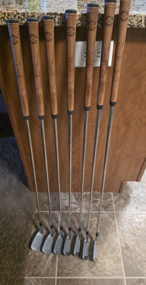 P790. 7-Piece Iron Golf Club Set (5-PW, AW) with Winn Dri-Tac Grips and Steel Shafts R flex