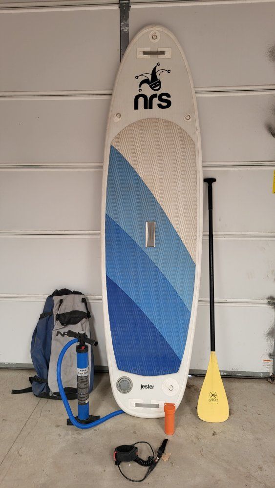 NRS Jester Inflatable Stand-Up Paddleboard (SUP) with Pump & Paddle, repair kit, leash,and pack to put it all in.