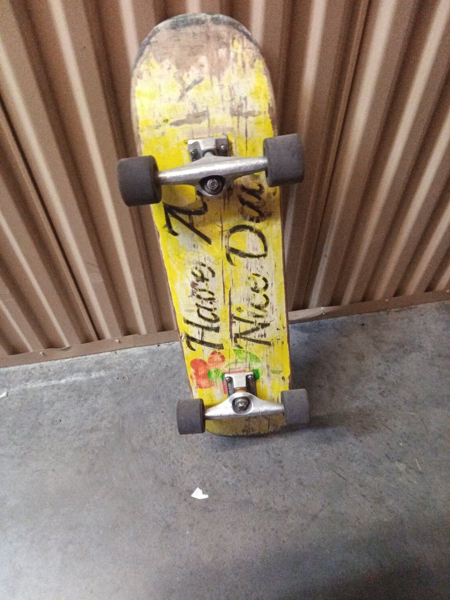 Used Skateboard with 'Have A Nice Day' Graphic - Yellow Deck, Silver Trucks, Black Wheels