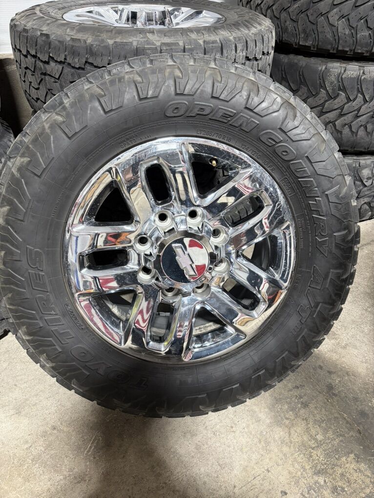 8x180 Chevy Stock Wheels w/ Toyo AT3 Tires