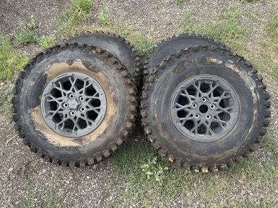 Set of 4 Maxxis Rampage Fury 32x10.00R15 Tires with Polaris Wheels