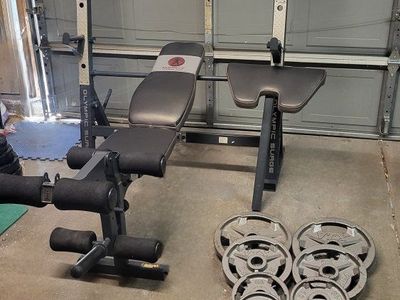 Bench and 160 pounds of weights