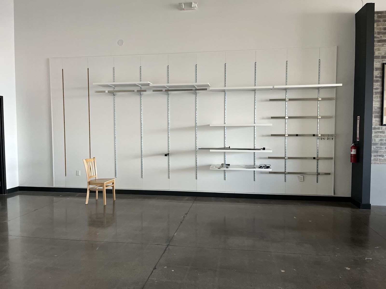 Retail Wall with 76 Shelves and Hangers