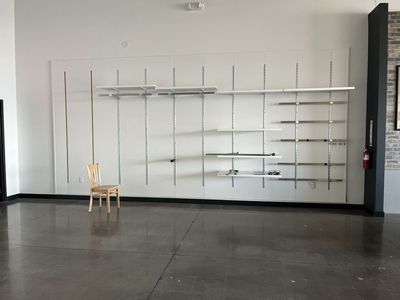 Retail Wall with 76 Shelves and Hangers